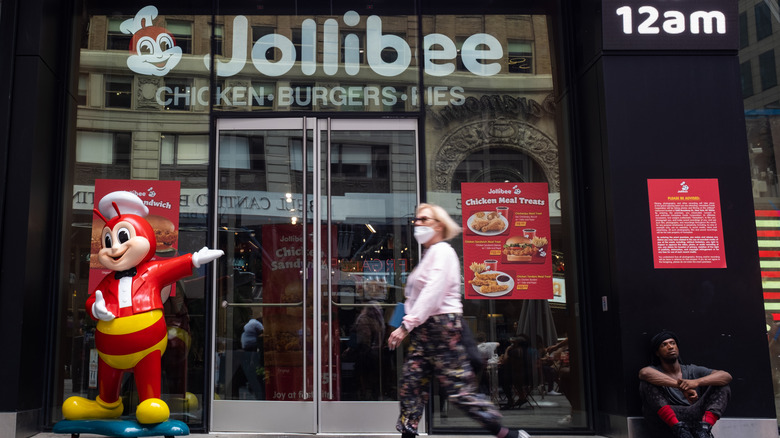 Glass-doored entryway of a Jollibee storefront in New York