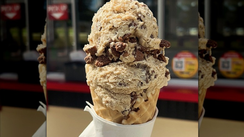 Scoops of special edition butter brickle ice cream in a cone