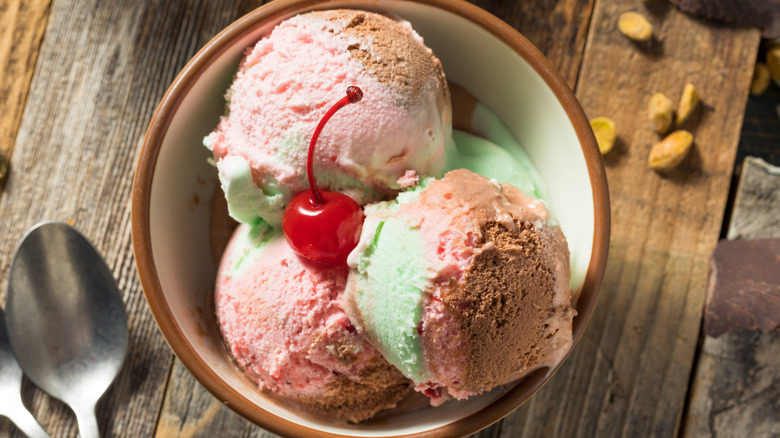 Bowl of spumoni ice cream with a cherry