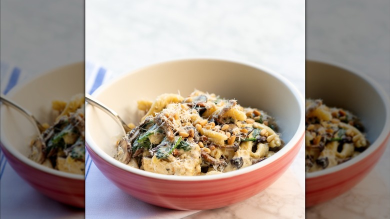 Strozzapreti pasta bowl from North Italia with chicken and mushroom on table