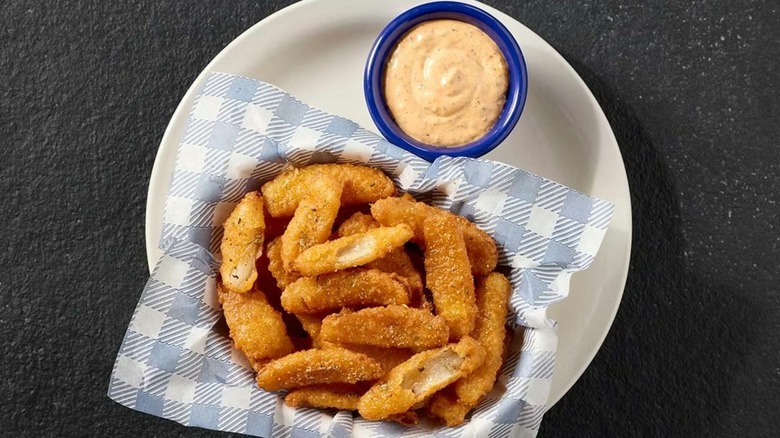 A plate of Cracker Barrel onion petals with comeback sauce