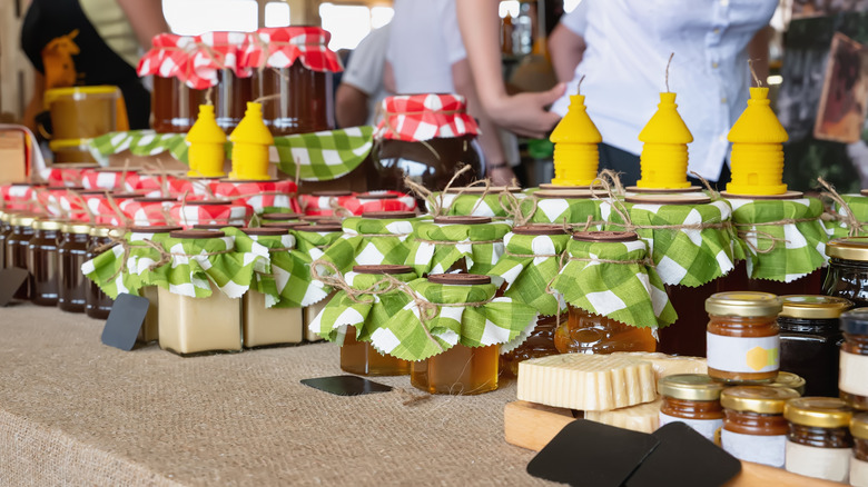 Jars of honey for sale at farmers market