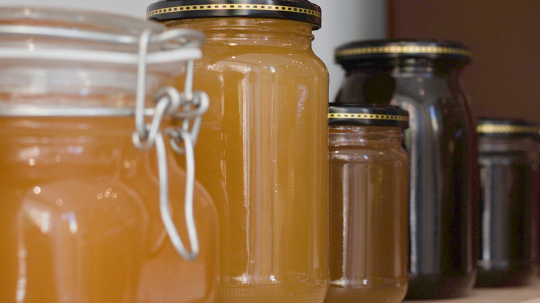 Jars of honey on shelf