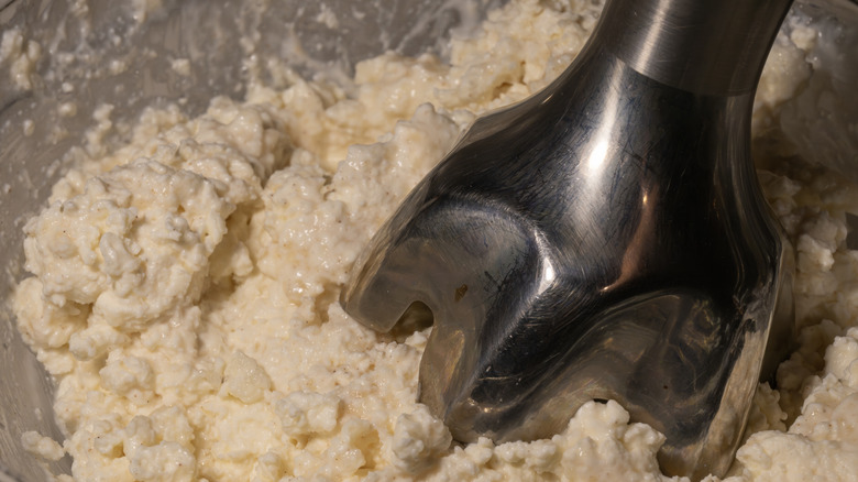 Immersion blender in cottage cheese