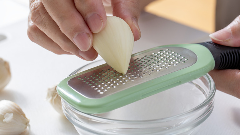 Grating garlic with a fine grater