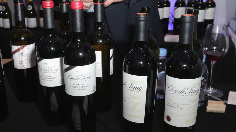 Several bottles of Charles Krug wine on display