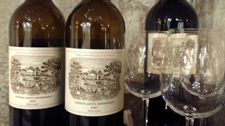 Two bottles of Château Lafite Rothschild 2007 with two wine glasses