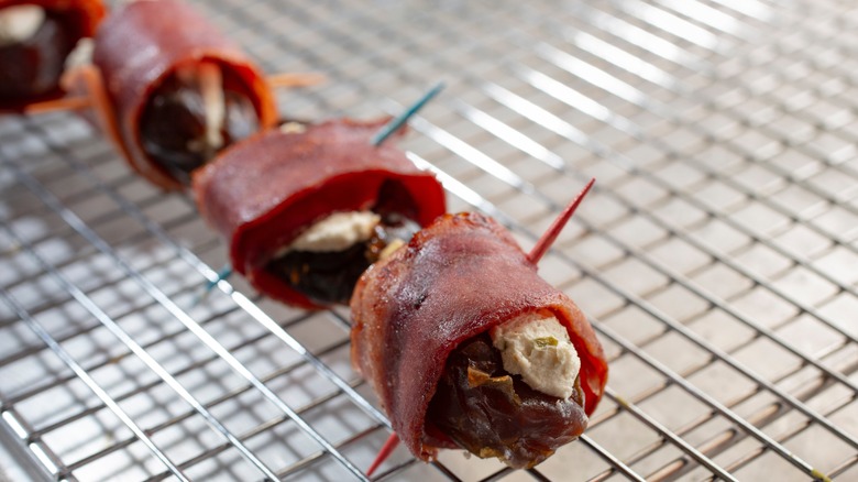 Devils on horseback on a wire rack