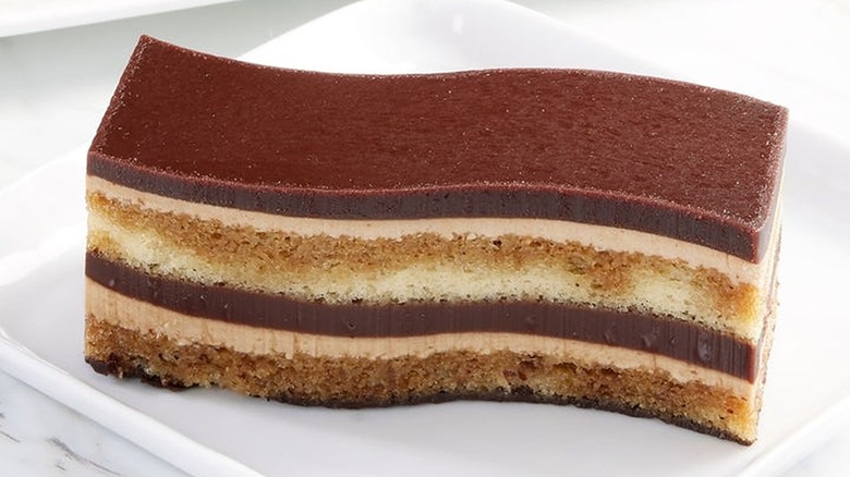 Close-up of slice of Classic Cake Opera Sizzle-cut Cake on plate.