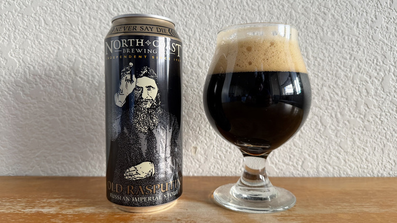 North Coast Old Rasputin can beside a full glass