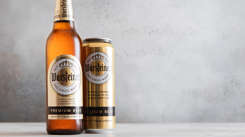 Bottle and can of Warsteiner Premium Pilsener