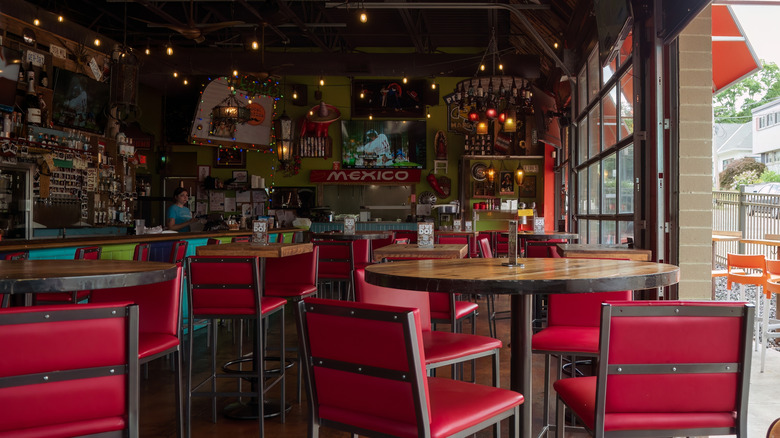 The interior of a Mexican restaurant with gimmicky decor in the background