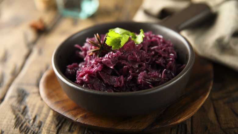 Braised red cabbage served in a small cast iron pan