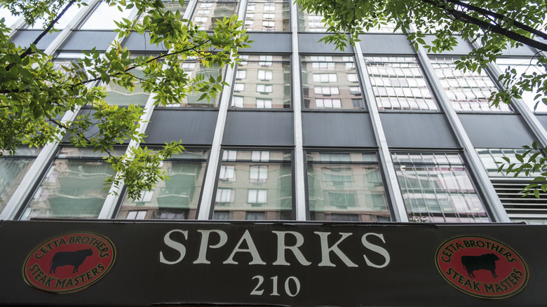 Low view of Sparks Steak House facade