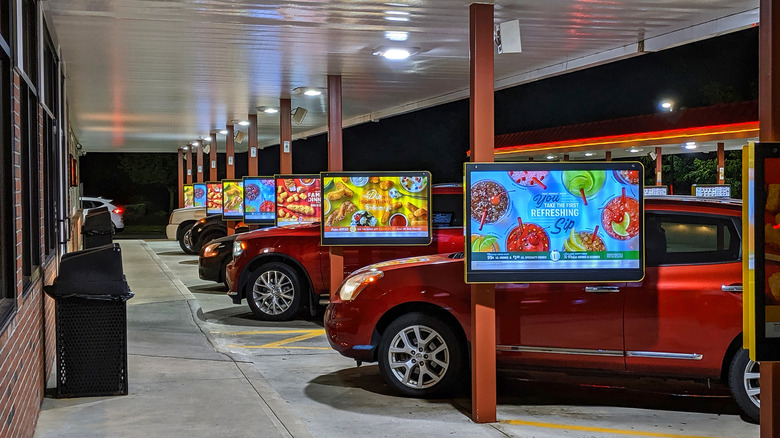 Line of cars parked in stalls at Sonic