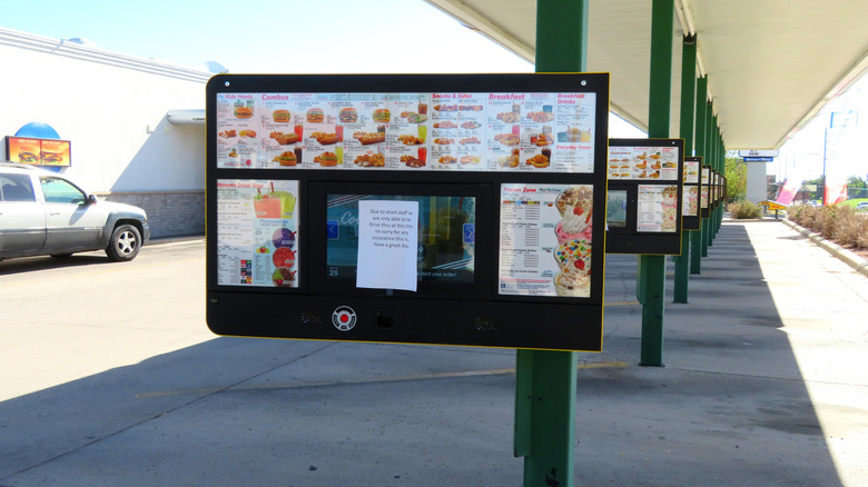 Stalls with menu and speaker button at Sonic