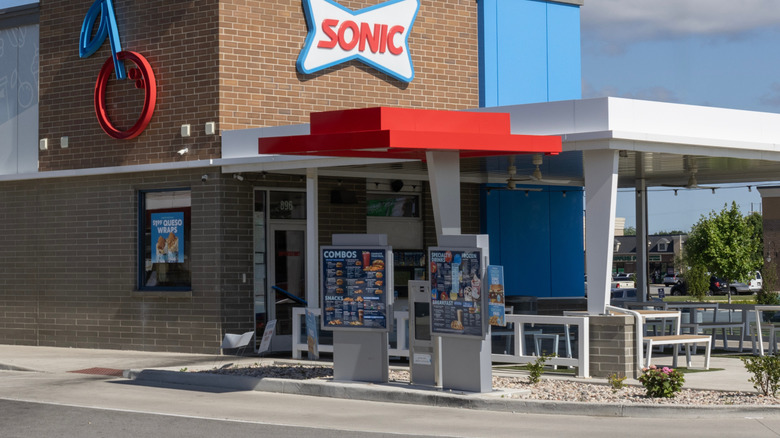 Picnic benches under awning at Sonic