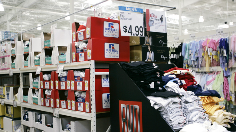 Clothing aisles in BJ's Wholesale Club showing prices