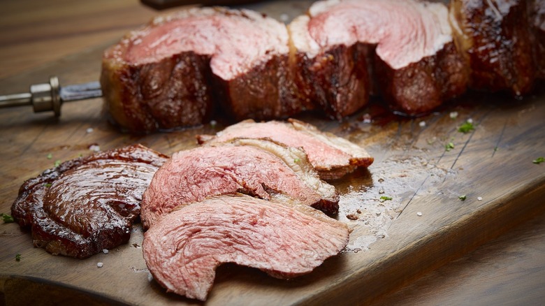 Sliced picanha on a board a favorite of many guests