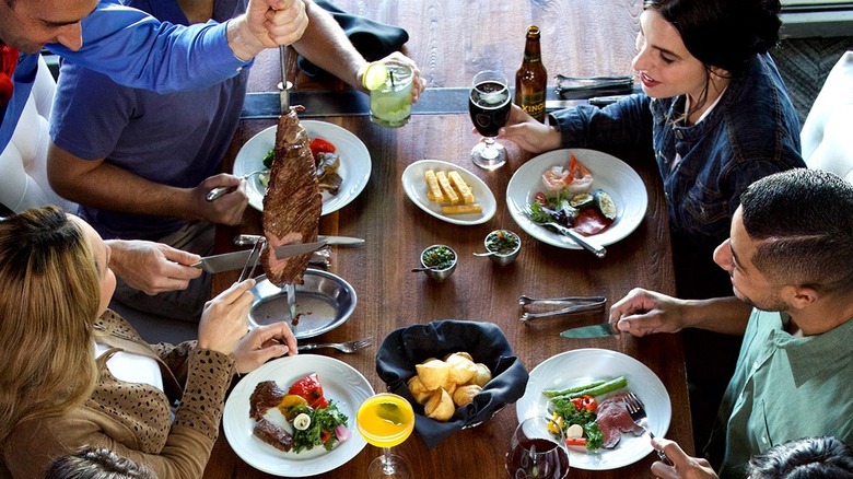 Table of people dressed in "smart casual" clothing