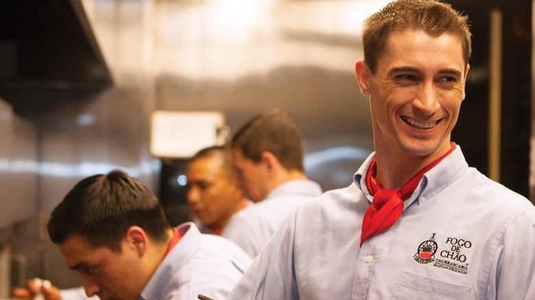 A team of gauchos with one facing the camera