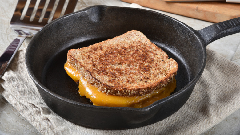 Grilled cheese sandwich in a cast iron pan