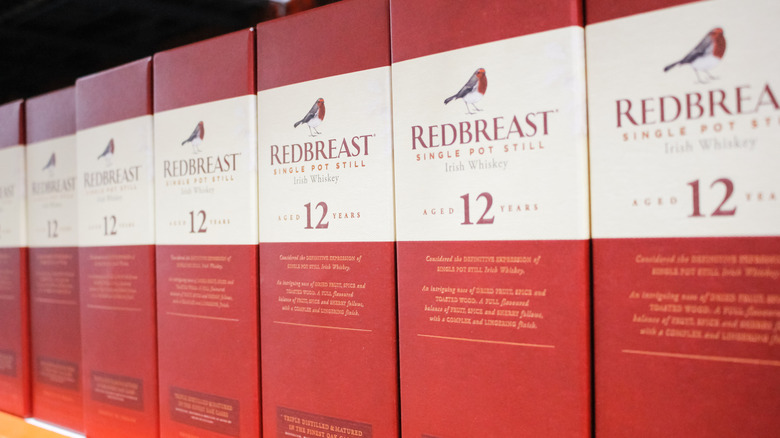 Boxes of Redbreast 12 Year on shelf