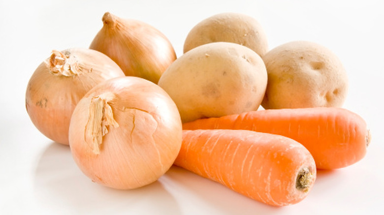 Raw potatoes, carrots, and onions