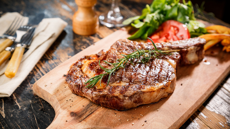 steak resting on cutting board