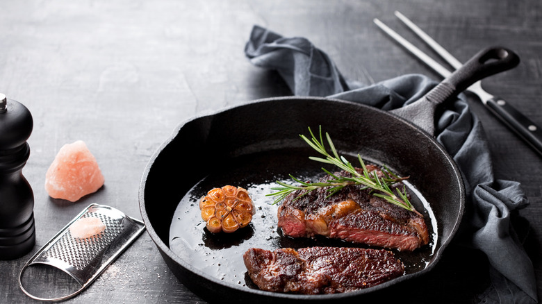 ribeyes in cast iron skillet