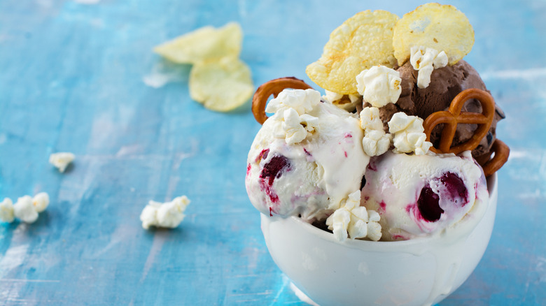 Ice cream with crunchy toppings, including pretzels and popcorn