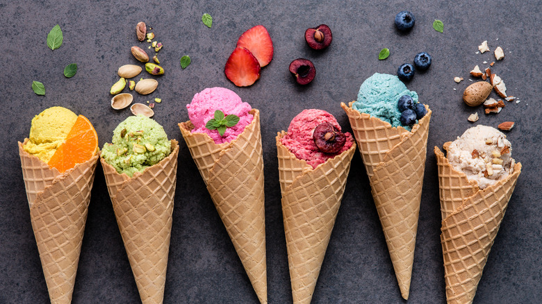 Various flavors of ice cream in cones