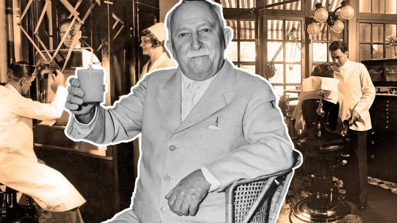 John Harvey Kellogg holding a glass