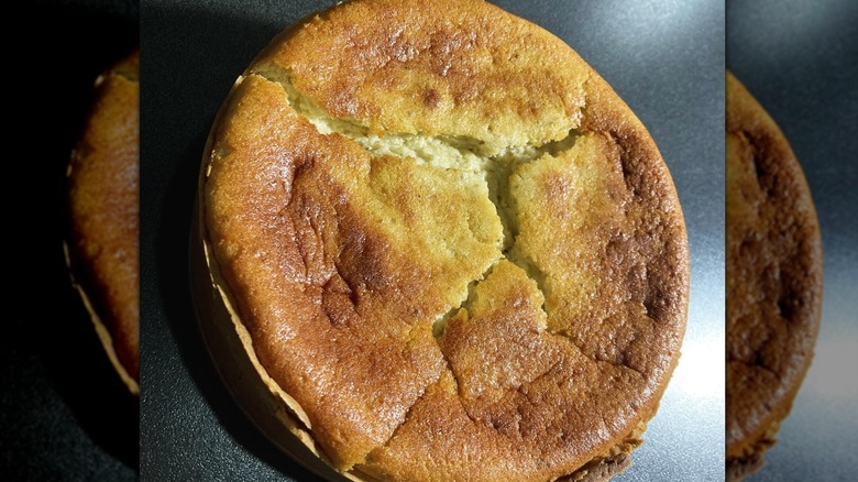 Baked old-fashioned cheesecake with a golden top