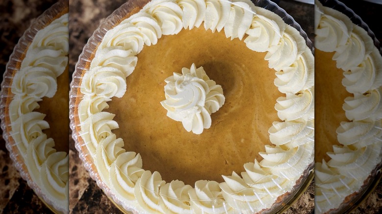 Sweet potato cheesecake with decorative whipped cream