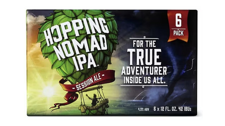 A box of Hopping Nomad beer featuring hops used as a hot air balloon in a storm