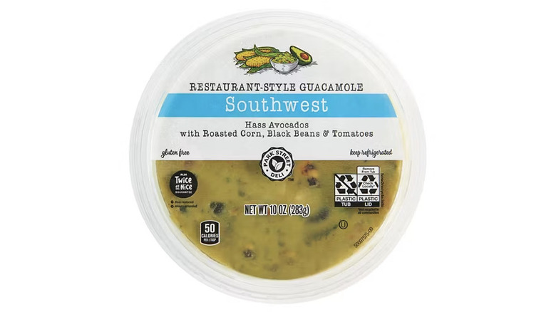 Restaurant style southwest guacamole in a plastic container