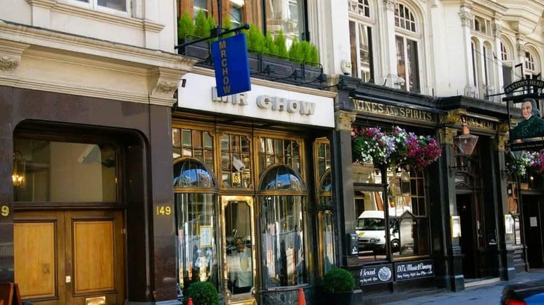 Exterior of Mr Chow restaurant on a London street.