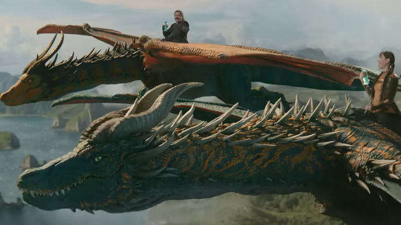 Aubrey Plaza and Nick Offerman riding dragons