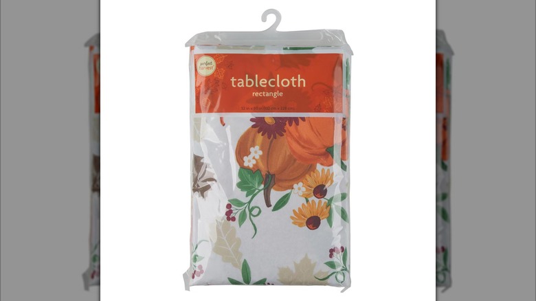Tablecloth with pumpkins and fall flowers