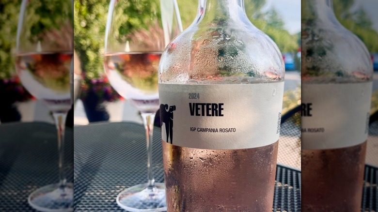 Close-up of Vetere with wine glass in the background