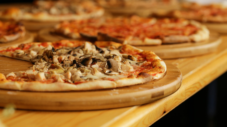 Close-up of thin crust pizzas