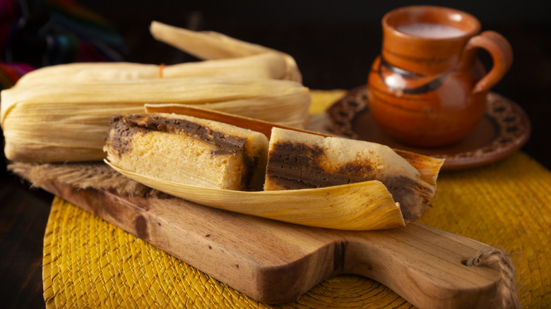 Corn tamale on cutting board