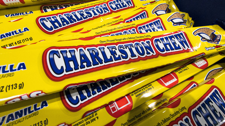 Sticks of Charleston Chews candies in packaging sit in a pile.