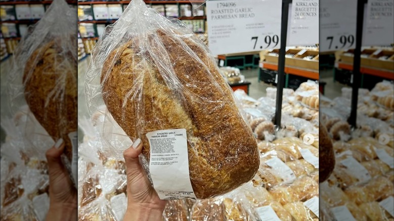 hand holding Costco garlic Parmesan loaf