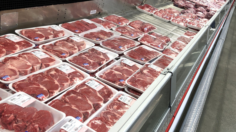 Packages of beef and steaks in Costco displays