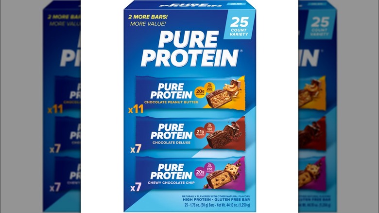 Variety pack of Pure Protein bars against white background.