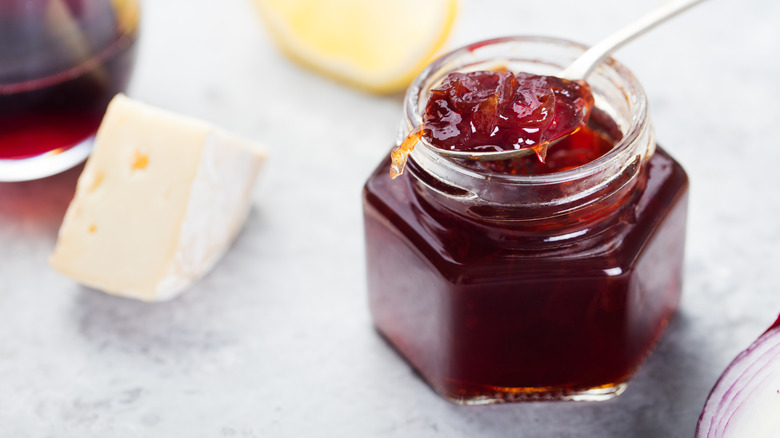 Jar of wine jelly and cheese