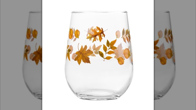 Stemless wine glass with a fall leaf design.