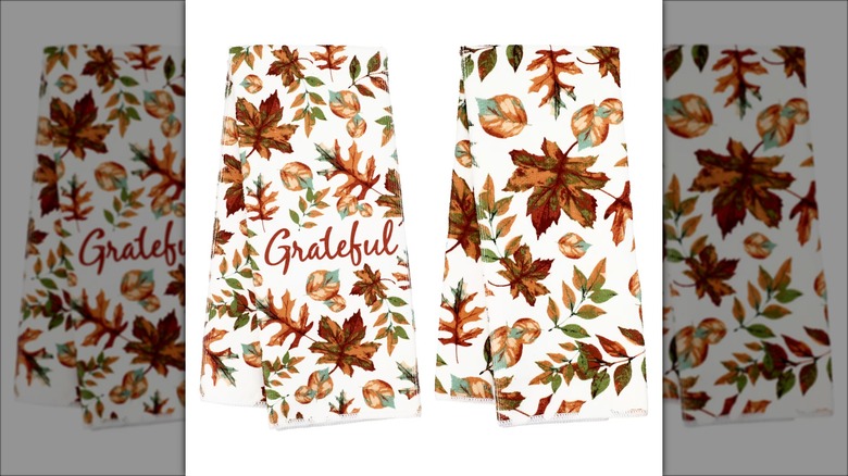 Two dish towels with autumn designs